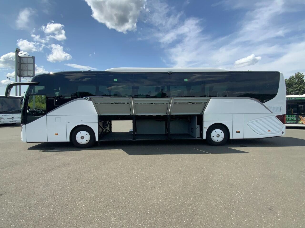 Setra S517 HD touring coach rear view with luggage doors
