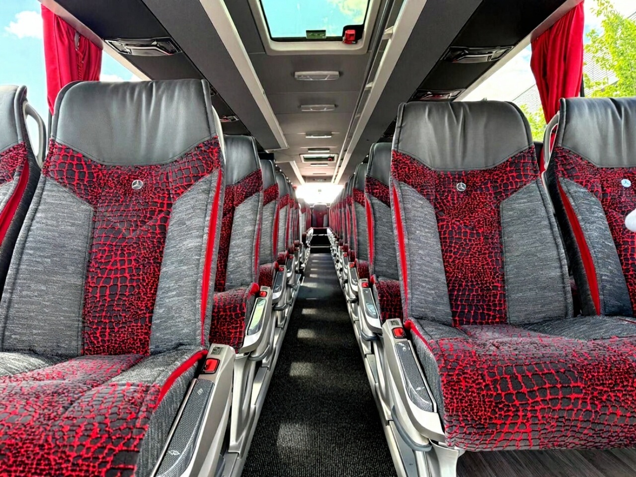 Mercedes Tourismo interior — spacious aisle view